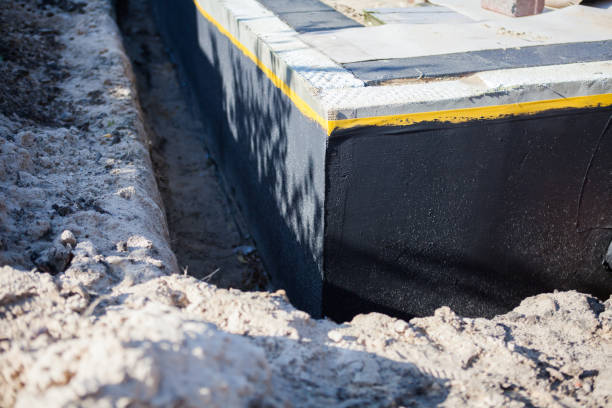 Professional Emergency Waterproofing technician working in Newberry, IN